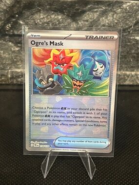 Pokemon‎ Ogre’s Mask Pokeball 118/131 Holo from Prismatic Evolutions M/NM
